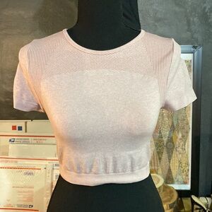 Gym top
Athletic top 
Size small
Color pink 
Color is closest to last pic